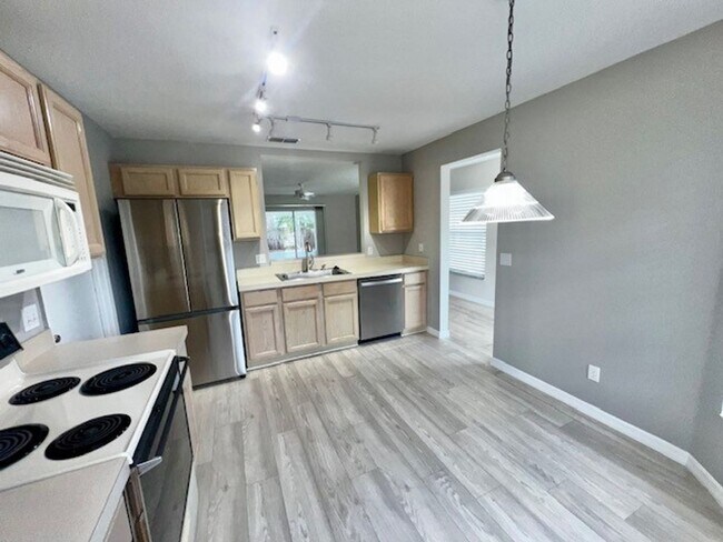 Building Photo - Welcome Home! Updated flooring & fresh interior paint! Move in OCTOBER! Beautiful 3X2 with attach...