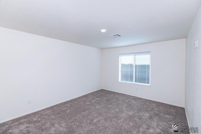 Building Photo - 7171 E 38th Ln