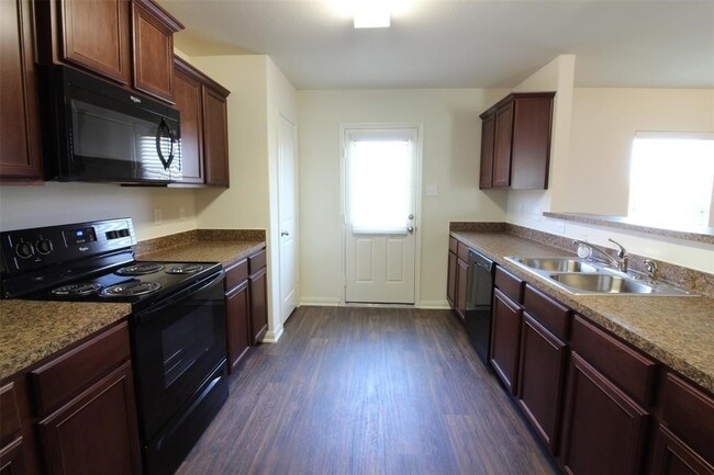 Building Photo - 8202 Sandy Sea Rd