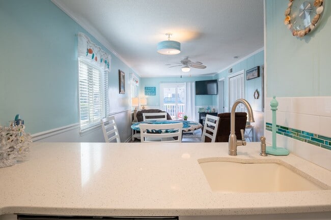 Building Photo - THIS OFF-SEASON MONTHLY RENTAL WILL HELP W...