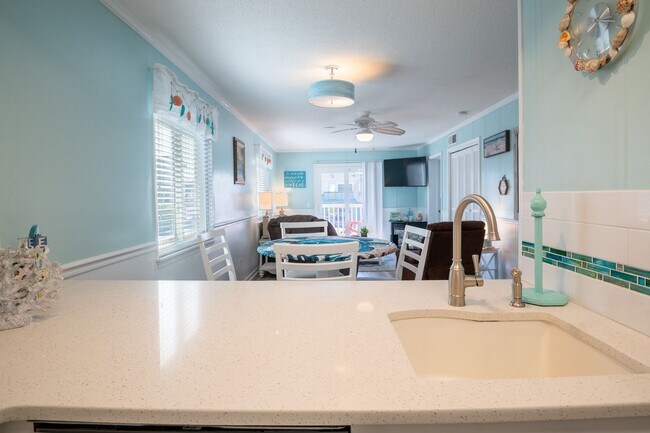 Building Photo - THIS OFF-SEASON MONTHLY RENTAL WILL HELP WITH THOSE WINTER BLUES