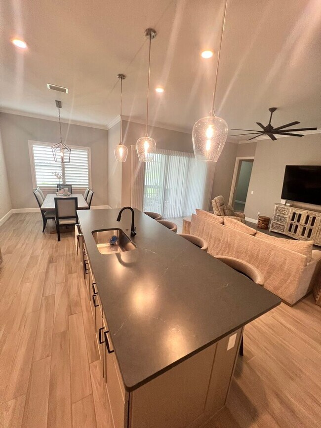 Building Photo - STUNNING LAKEFRONT 3 BEDROOM, 2.5 BATH HOM...