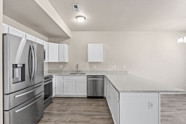 Building Photo - Updated 3-Bedroom Townhome with Private Ya...