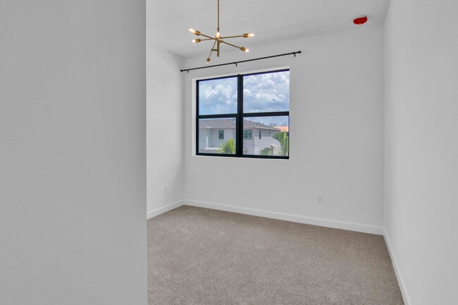 Building Photo - 14075 SW Thorens Dr