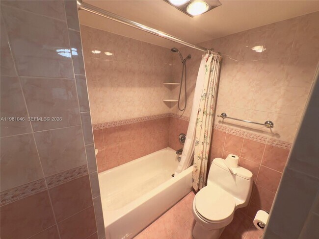 Building Photo - 3675 N Country Club Dr