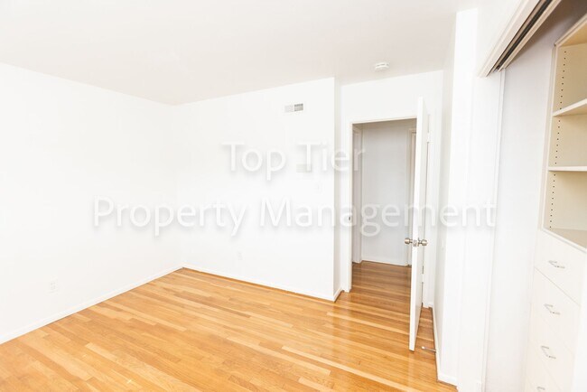 Building Photo - Charming Mid-Century Home | 4BR, 3BA | 2,4...