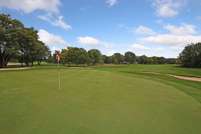 Building Photo - Live Where Coon Rapids Plays — Golf, Waves, and a Home That's Ready to Go