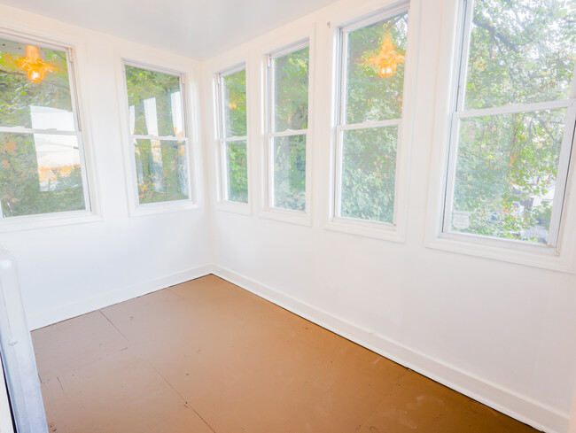 sunroom off the primary bedroom - 68 Llewellyn Ave