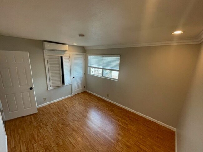 Building Photo - "Coming Soon" Awesome corner 2 Bedroom 2 Bath Townhome with large private patio (AC/Pool/Gated Pa...