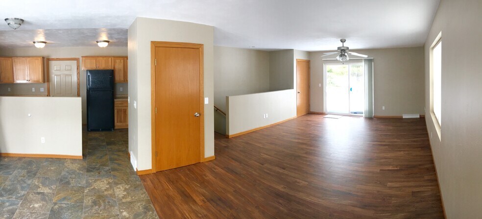 Luxury Vinyl Plank flooring throughout living room and hallway areas. - 325 Cordy Lane