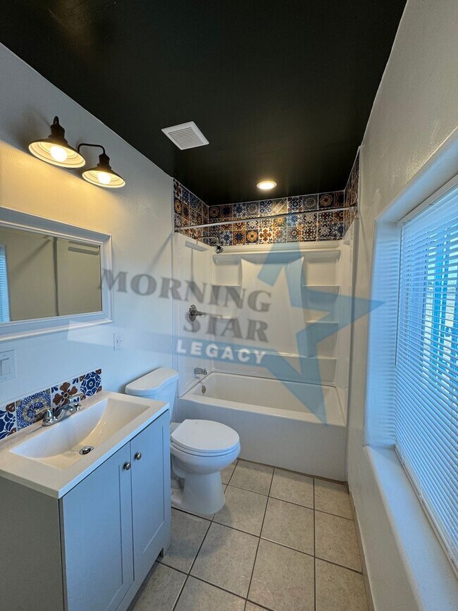 Building Photo - Charming Updated Home w/ Enclosed Yard & Storage