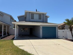 Building Photo - Two Story home - Three bedrooms, 2.5 baths near school and shopping