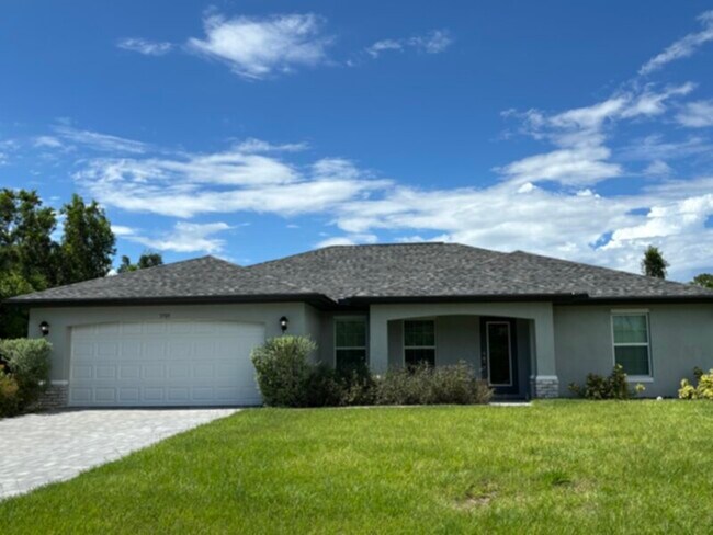 Building Photo - Spacious 4 Bedroom 2 Bath Home in NW Cape! Coming Soon!