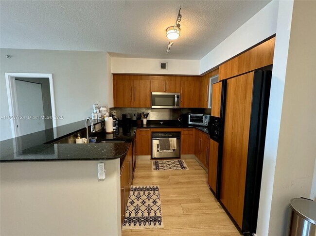 Building Photo - 335 S Biscayne Blvd