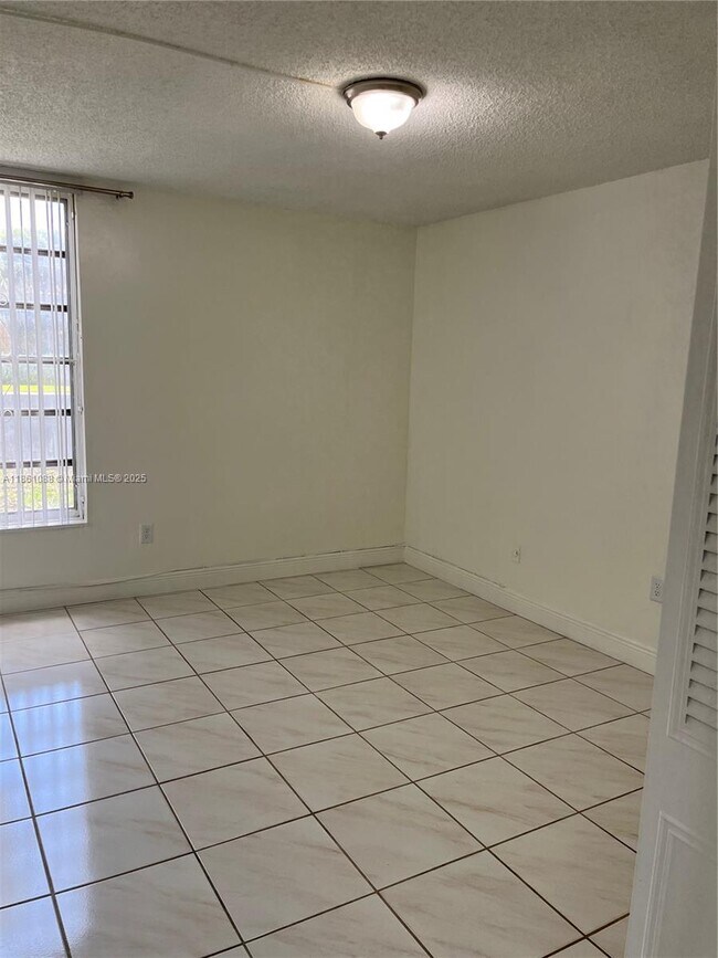 Building Photo - 8841 W Flagler St