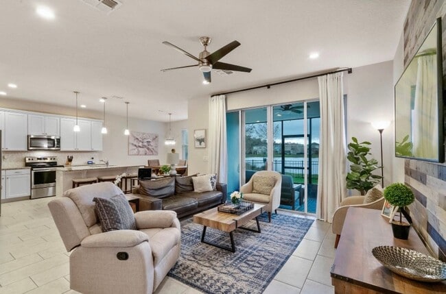 Building Photo - Water Front Home- 4 Large Bedrooms-3 baths Gated Community Call Sheila Campbell 407-687-7900