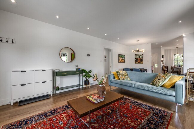 Building Photo - Charming 1935 Tudor in 15th & 15th – Renovated with Modern Luxury