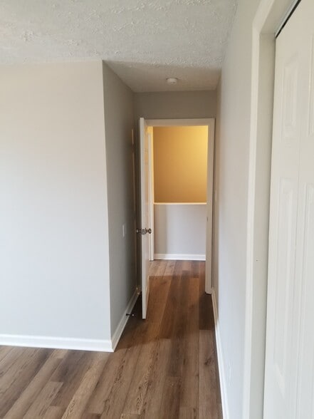 Bedroom 2 looking towards stairs - 1445 Toshiba Drive, #B
