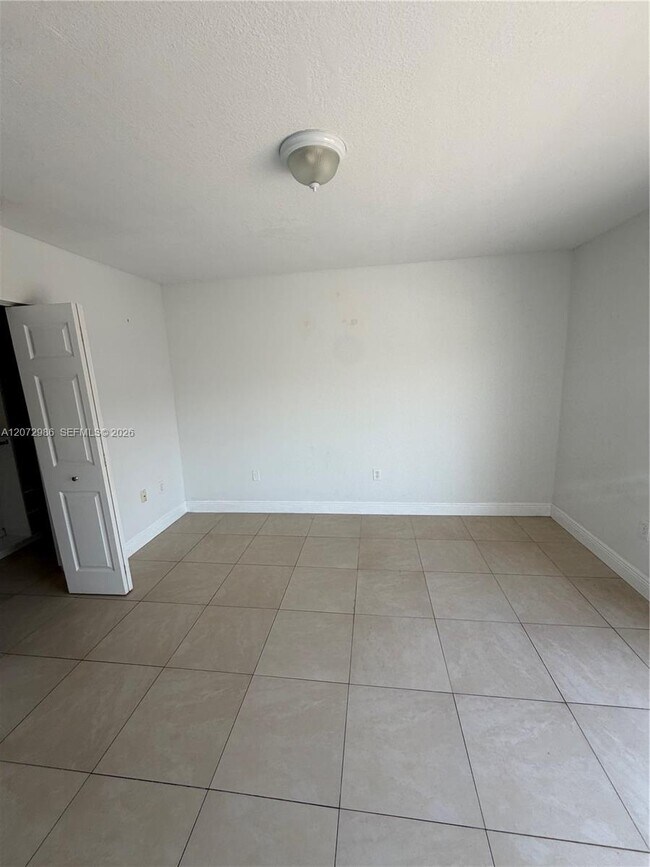 Building Photo - 7040 NW 173rd Dr