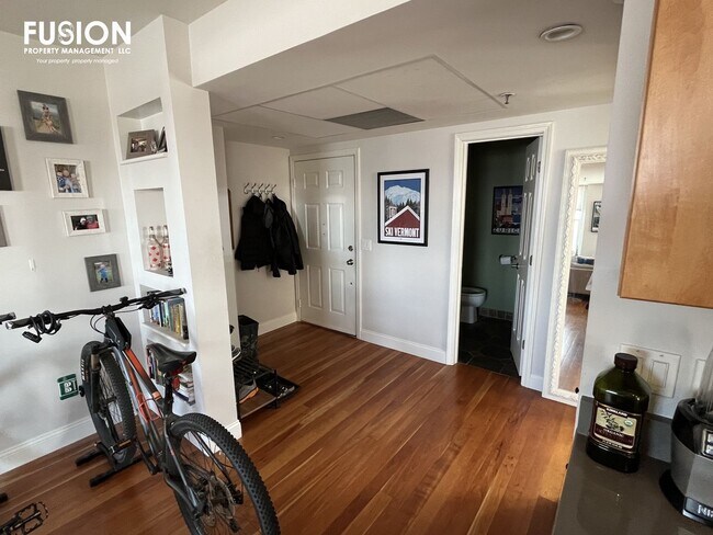 Building Photo - STUNNING LAKE VIEWS - Modern 2BR/2BA Corner Unit in The Vermont House