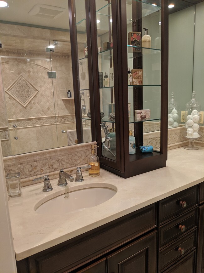 bathroom with marble countertop - 8290 Armetale Ln