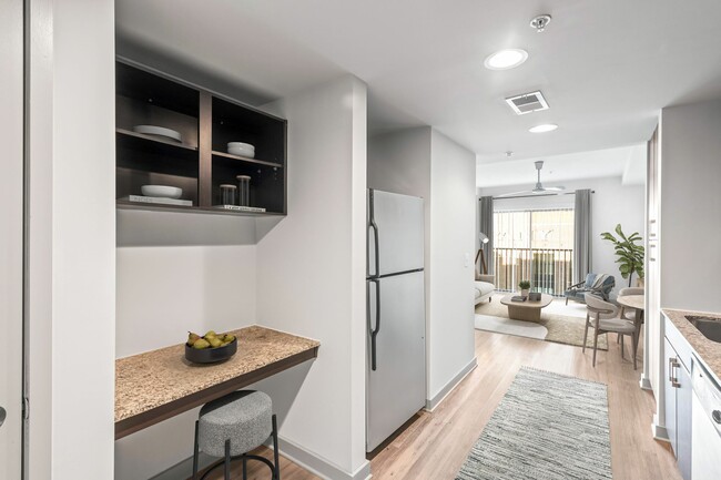 Explore this chic apartment with a seamless flow from kitchen to living room, perfect for entertaining at Cottonwood Westside Apartment in West Midtown Atlanta - Cottonwood Westside