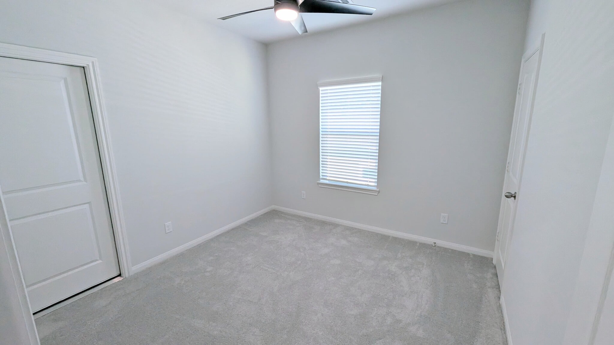 Bedroom 3 has direct attic access, ceiling fan, and lots of natural light. - 13218 HP Johnson St