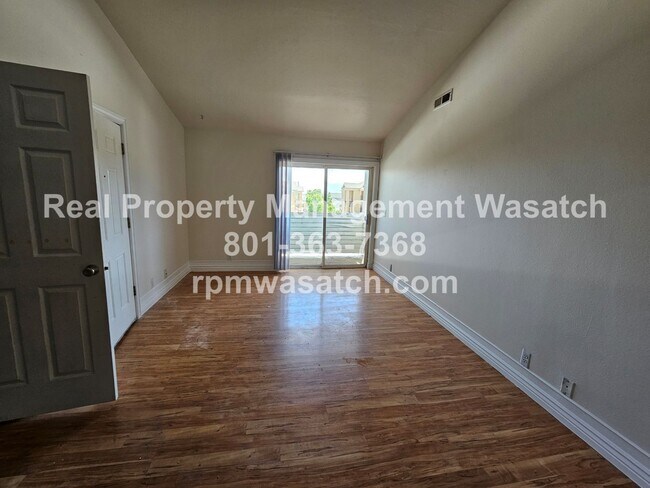 Building Photo - Move In Special!  1/2 Off First Months Rent  Check Out This 3 bed, 2 bath Condo with Hardwood Flo...