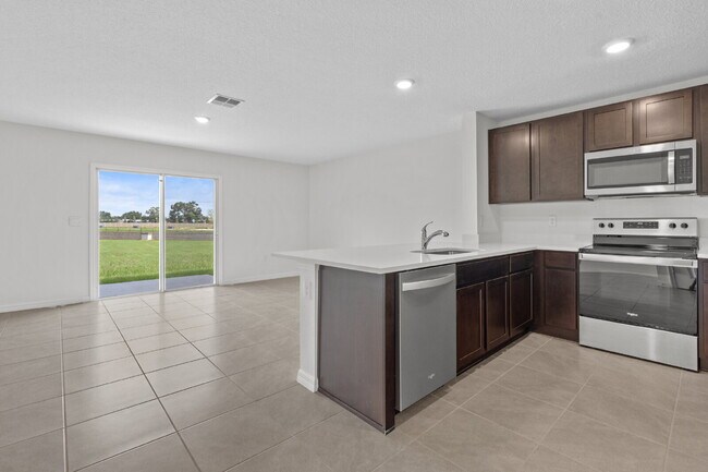 Building Photo - "Spacious 3-Bedroom Townhouse in Ocala wit...