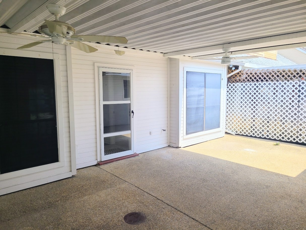 Private Partially Covered Patio with 2 ceiling fans for relaxing and entertaining - 12439 Coursey Blvd
