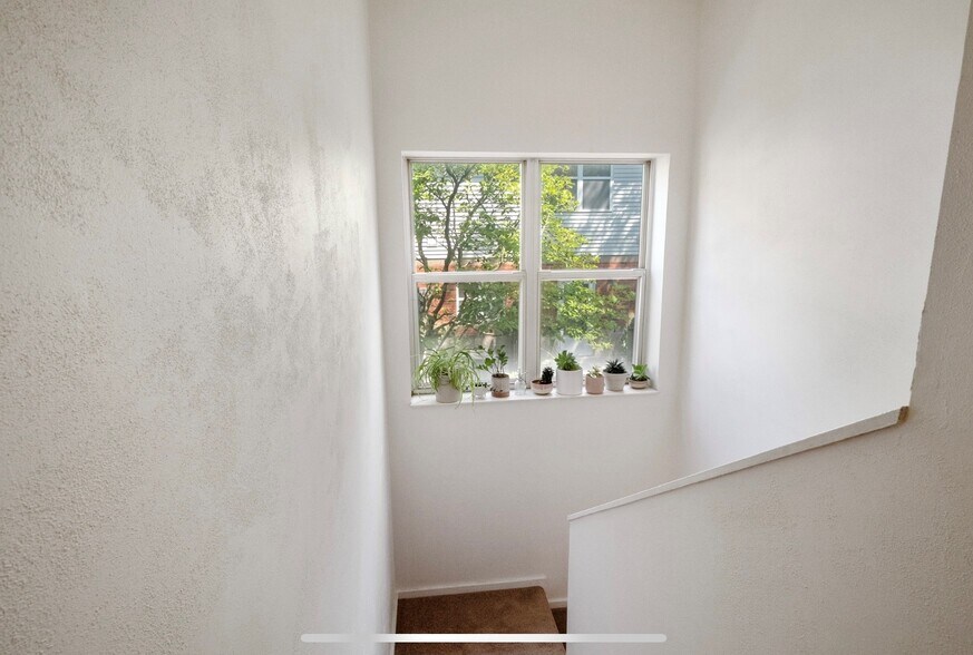 Staircase leading up to 2 bed 2 bath - 4109 Westminster Pl