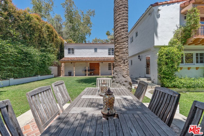 Building Photo - 221 S Beverly Glen Blvd