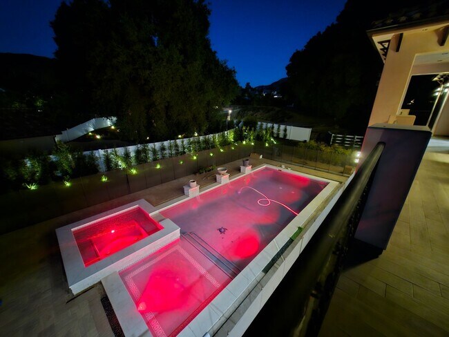 Building Photo - Exquisite 5-Bedroom Luxury Pool Home with ...