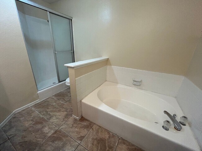 Building Photo - BEAUTIFULLY RENOVATED HOME WITH NEW PAINT, CARPET, AND LIGHT FIXTURES