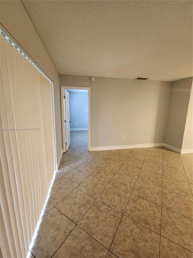 Building Photo - 10960 NW 29th Ct