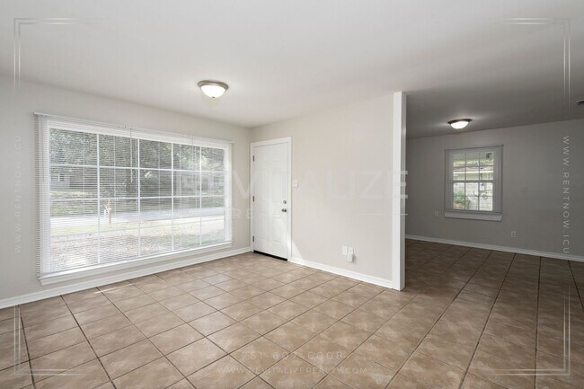 Building Photo - Cozy, Updated 3-Bedroom Home with a Shady Yard!