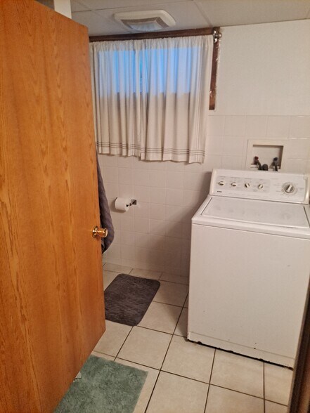Second bathroom has a shower as well as the laundry facilities - 801 W 28th St