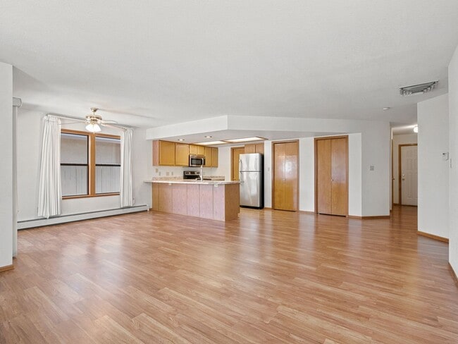 Building Photo - Spacious 2BR Rental with Open Floor Plan & Low-Maintenance yard