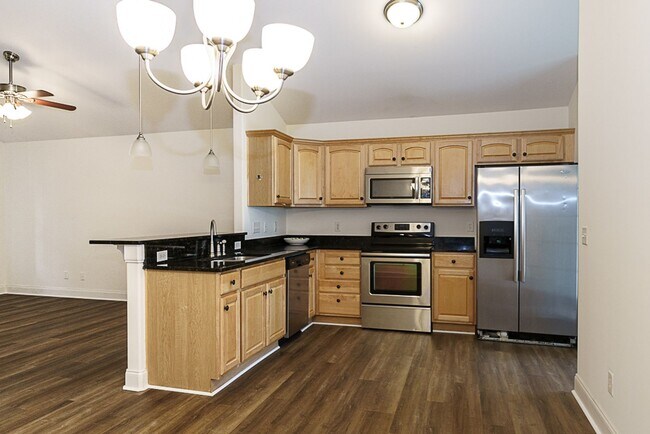 Building Photo - Three Bedroom House with Gated Backyard