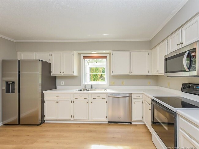Building Photo - 4916 Royal Adelaide Way