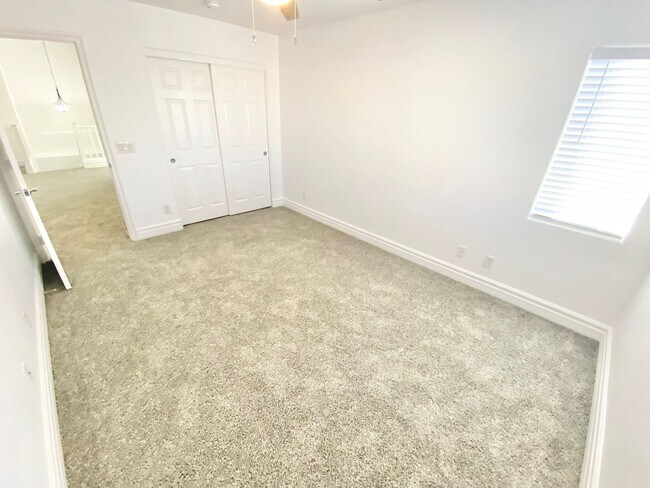 Building Photo - STUNNING 2 STORY HOME IN A GUARD GATED COM...
