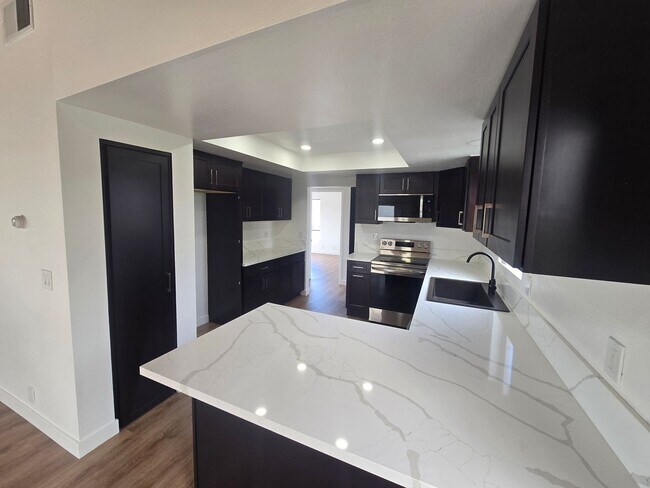 Building Photo - Remodeled 3 Bedroom 2 Bath 2 Story House, ...