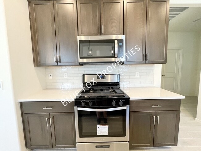 Building Photo - 10692 W Dickerson Dr