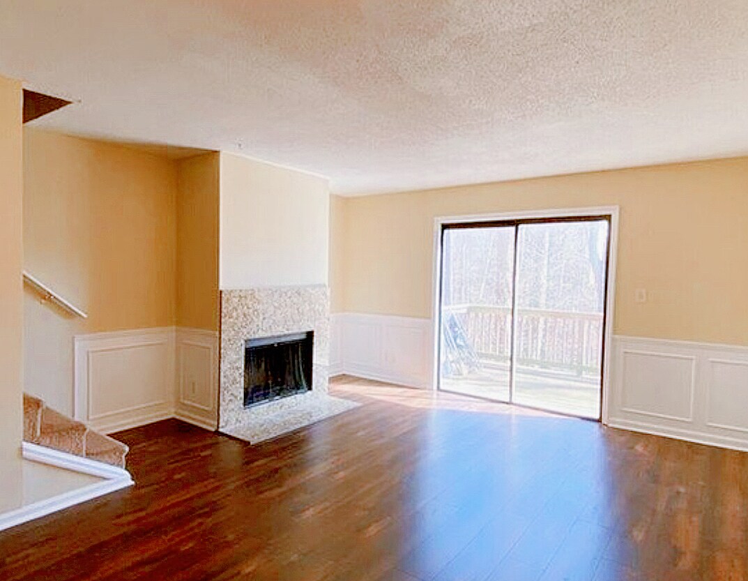 Living room with electric fireplace - 2493 Hidden Cove Ct