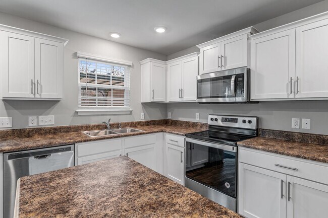 Building Photo - Newer Home in Reedy Fork, So Many Upgrades, SS Appliance, Loft, Garage, Fenced!