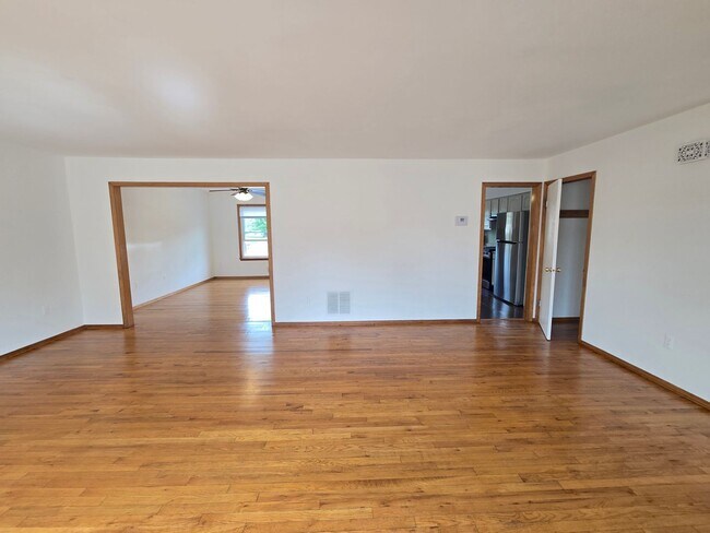 Building Photo - Updates abound at this SPACIOUS, half duplex with 3+ off-street parking spots, 3-bedrooms and 2 f...
