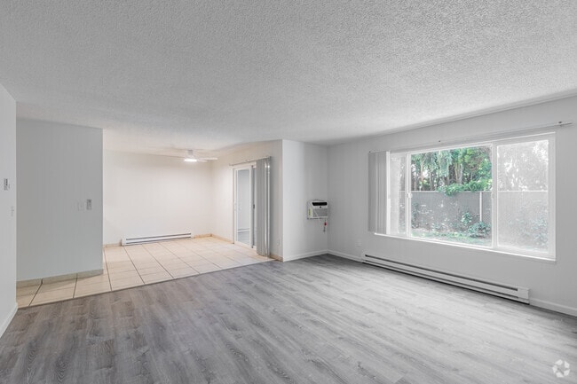 2BR, 1BA - 1014SF - Living Room - Images Springcreek Apartments