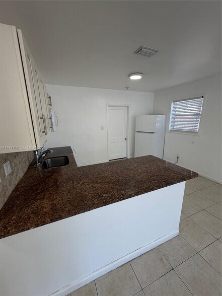 Building Photo - 6400 SW 58th Pl