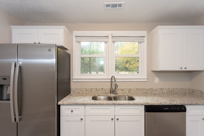 Building Photo - Welcome to this Newly Remodeled Home in a Stellar Location