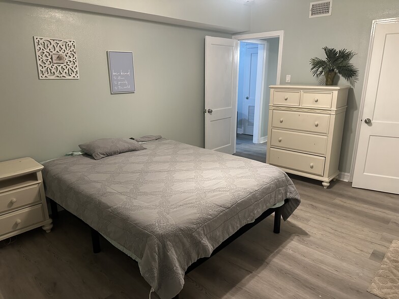 Large 1 bedroom with Partially Furnished Queen Bed and Cabinet for Clothes with Closet - 2312 53rd St